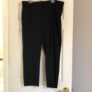 Black dress trousers. Pockets. Straight legs